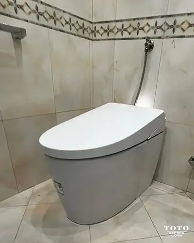 установка_электроного_унитаза_тото